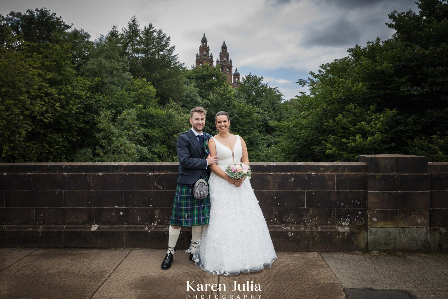 bride and groom portrait in Kelvingrove park on their wedding day