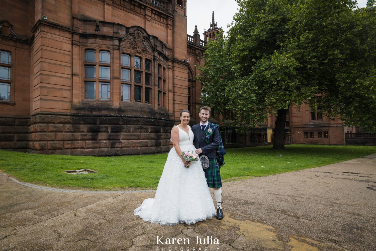 bride and groom portrait on their wedding day outside Kelvingrove Art Galleries