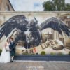 bride and groom portrait on their wedding day outside Wedding Photography at Saint Luke's & The Winged Ox