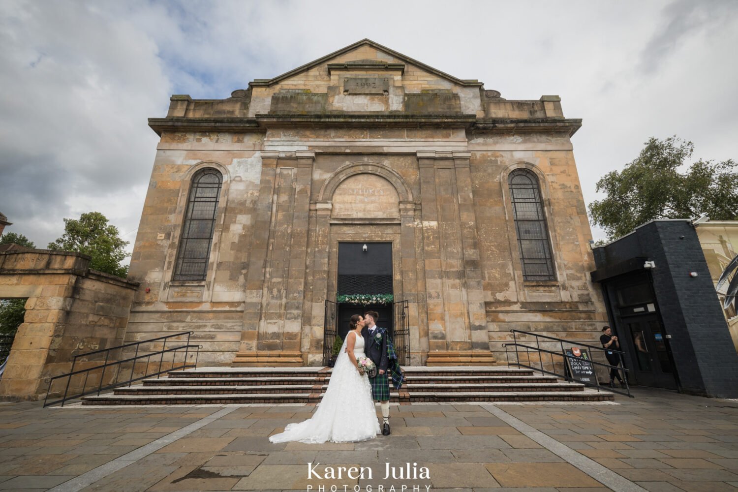 bride and groom portrait during their wedding photography at Saint Luke's & The Winged Ox