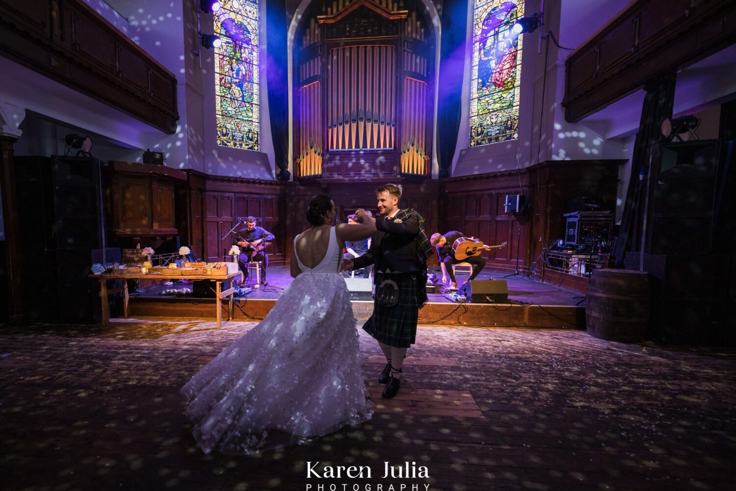 bride and groom first dance during their Saint Luke's wedding 