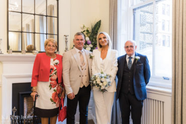 group photo with wedding guests in the Kelvin room