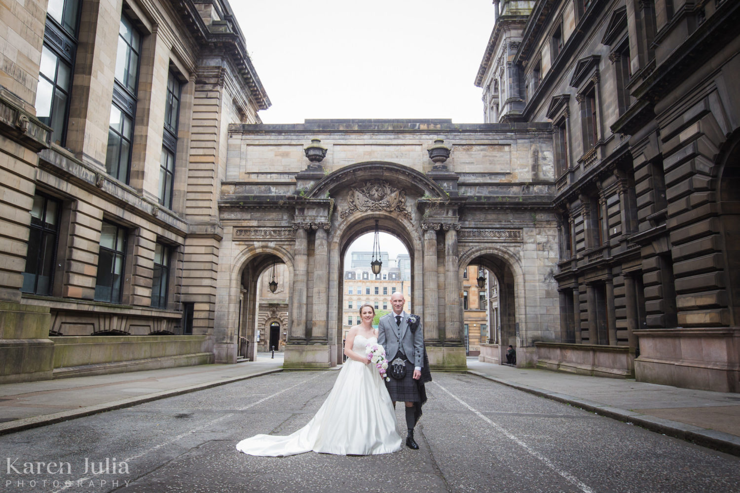 bride and groom portrait in John Street in front of the arches on their wedding day.