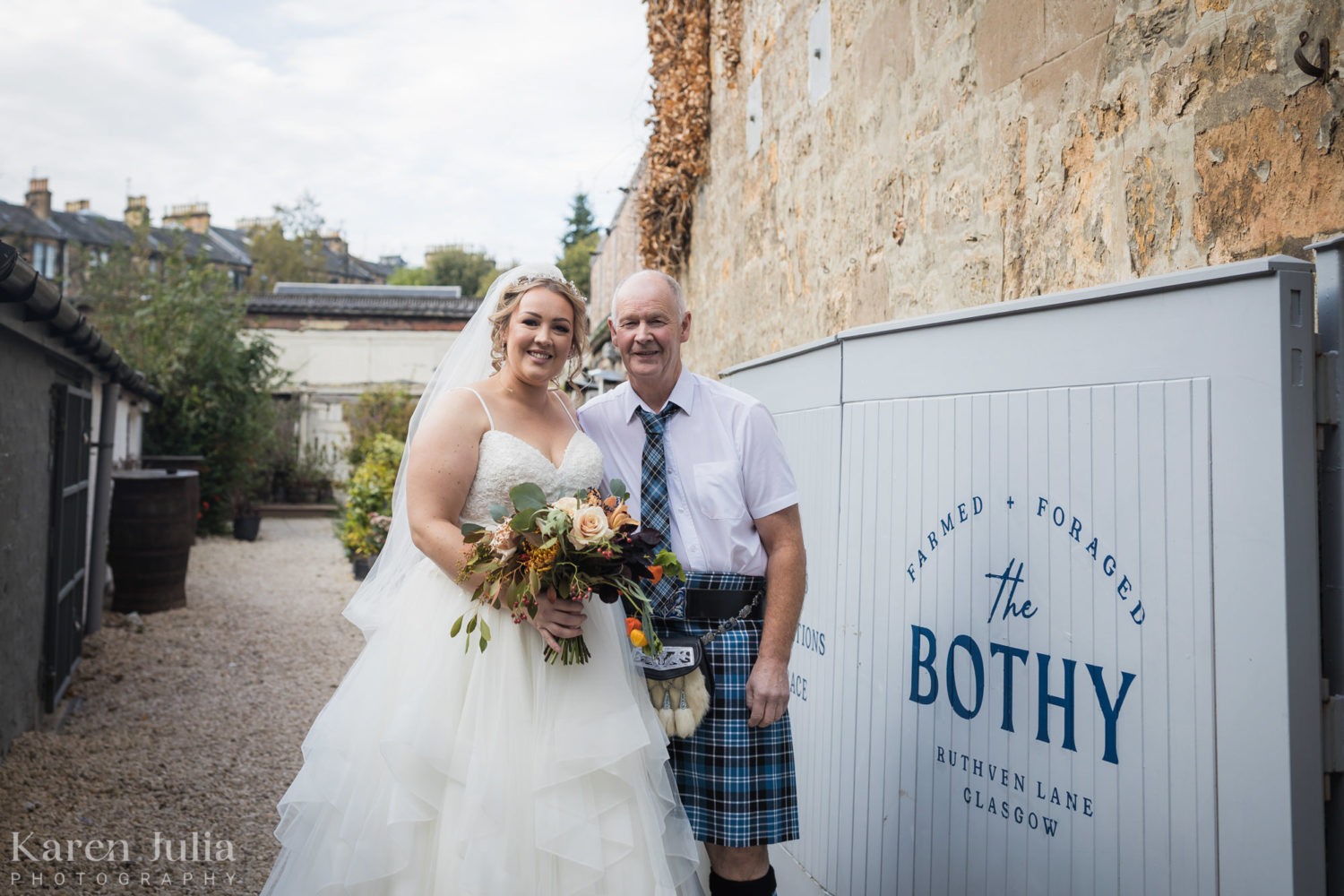 portrait of bride and her dad as they arrive at the Bothy for the wedding
