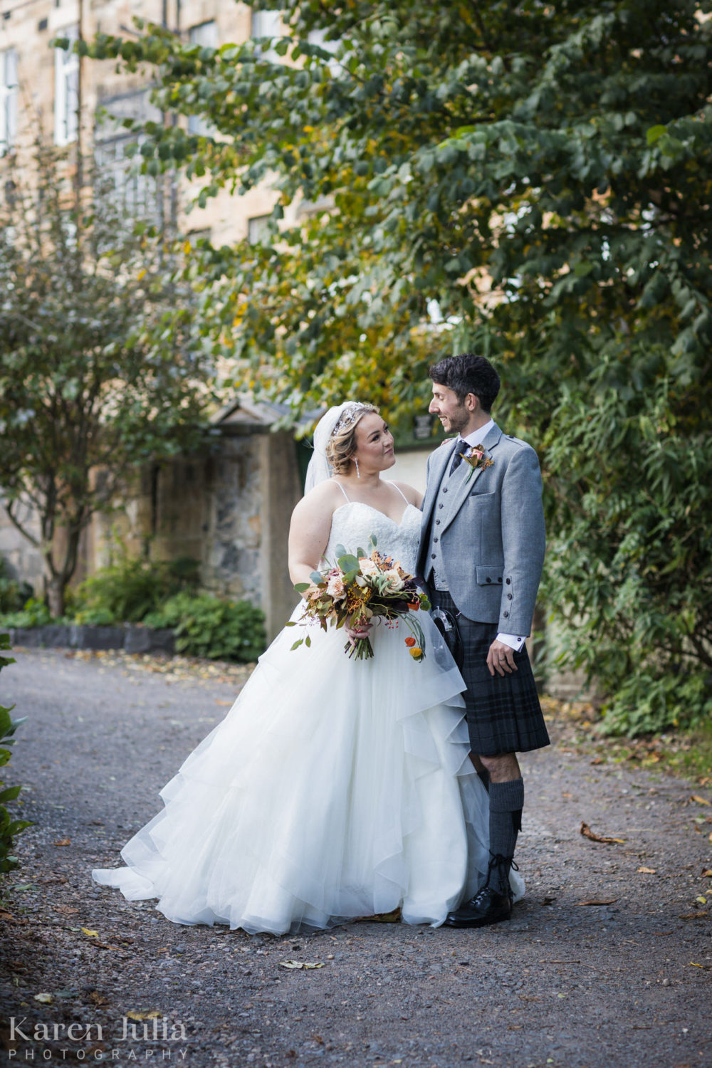 bride and groom having a moment together in Victoria Crescent Lane during their wedding day at the Bothy