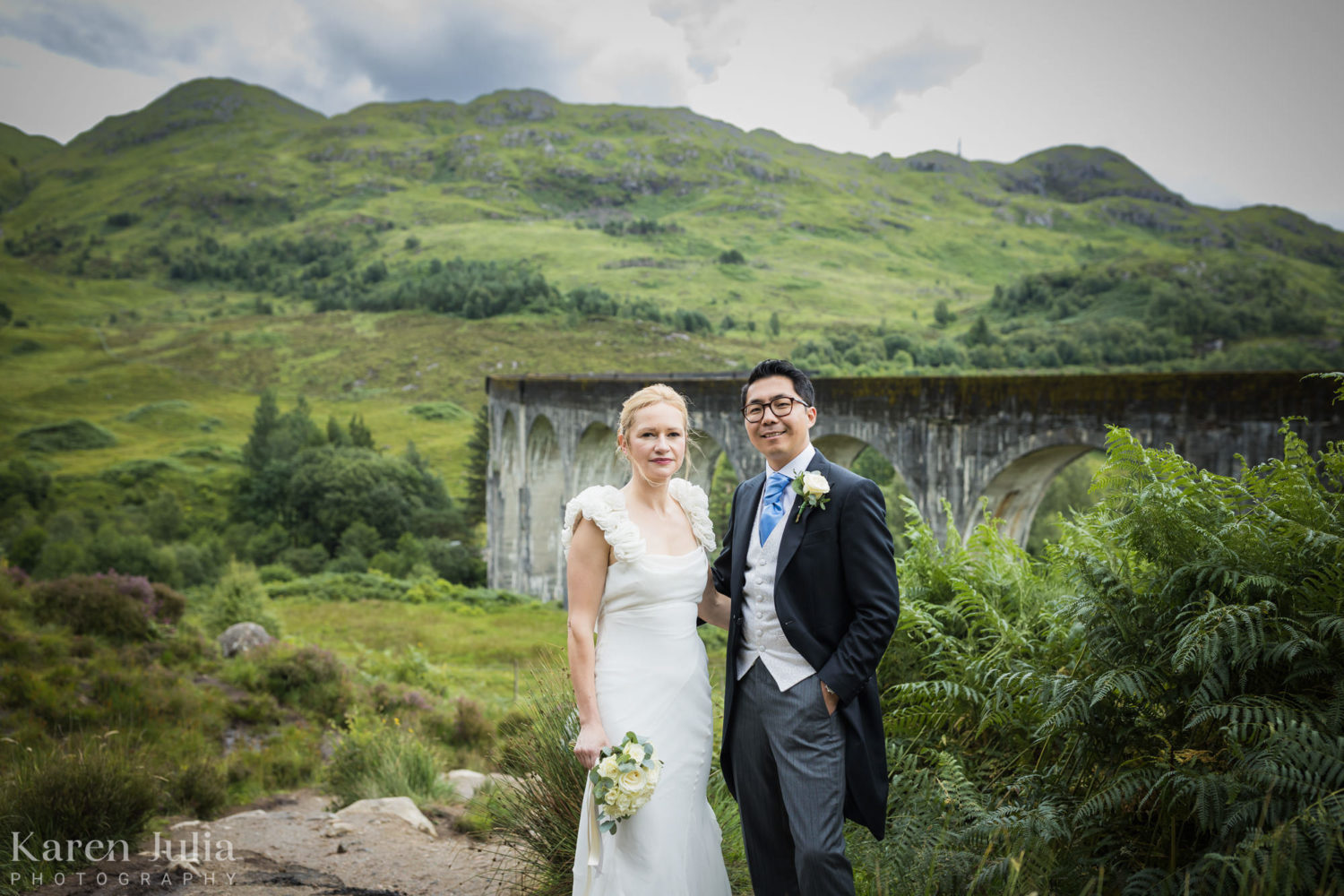 bride and groom portrait in front of the Glenfinnan viaduct