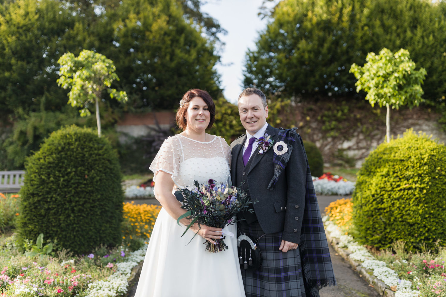 bride and groom portrait in the Victorian walled garden at Bellahouston Park