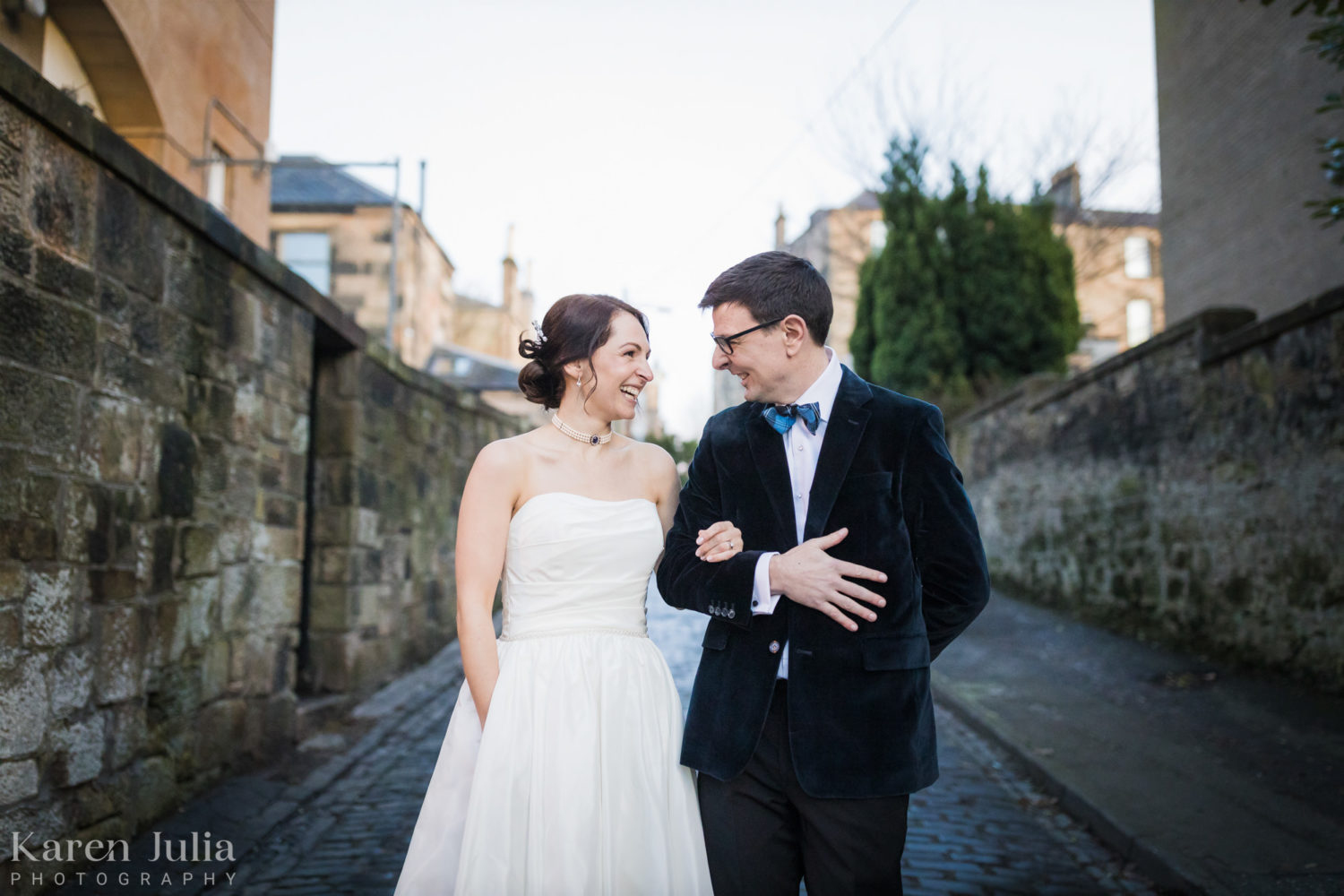 bride and groom portrait in the cobbled lane behind One Devonshire Gardens