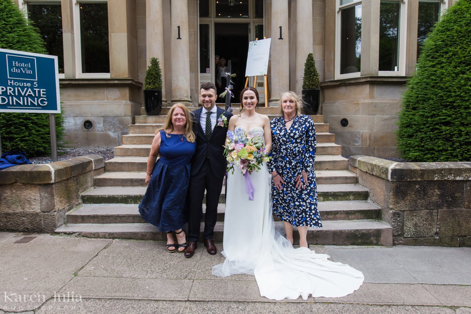 wedding group photos on the stairs at One Devonshire Gardens