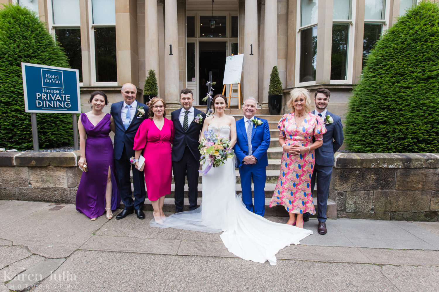 wedding group photos with friends on the stairs at One Devonshire Gardens