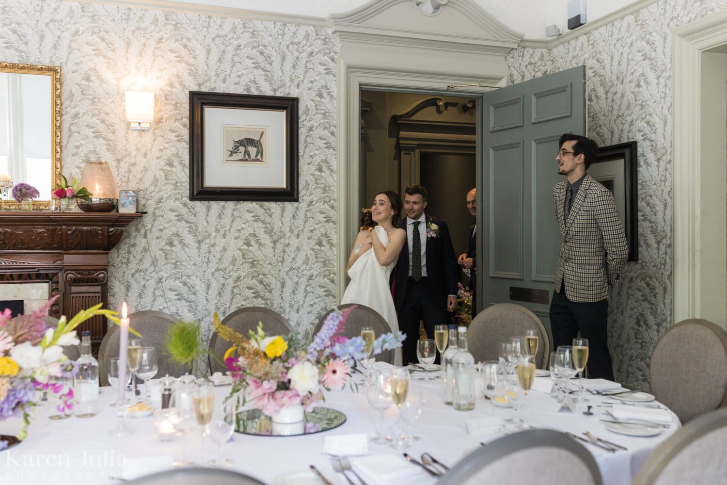 bride and groom see the wedding breakfast room for the first time