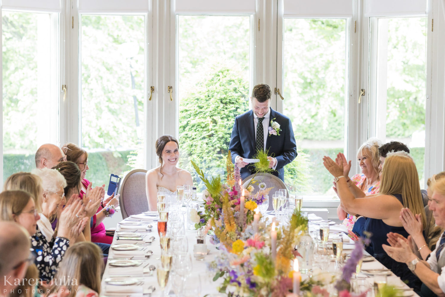 groom delivers speech in the Glenlivet room as guests watch