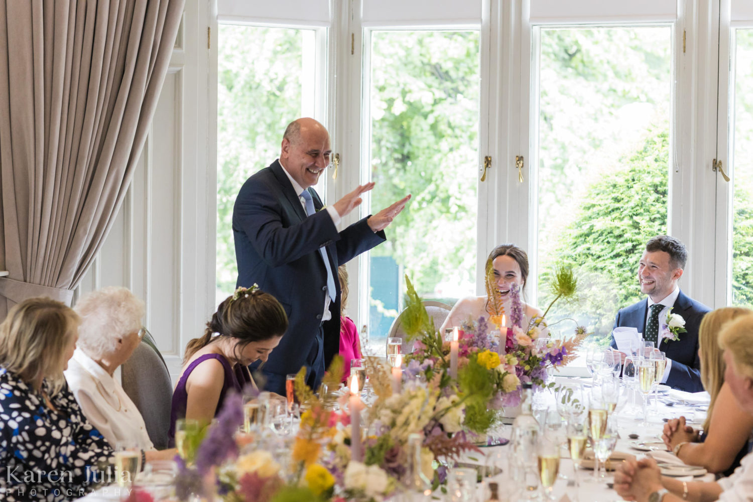 brides dad delivers a speech to the happy couple and their guests