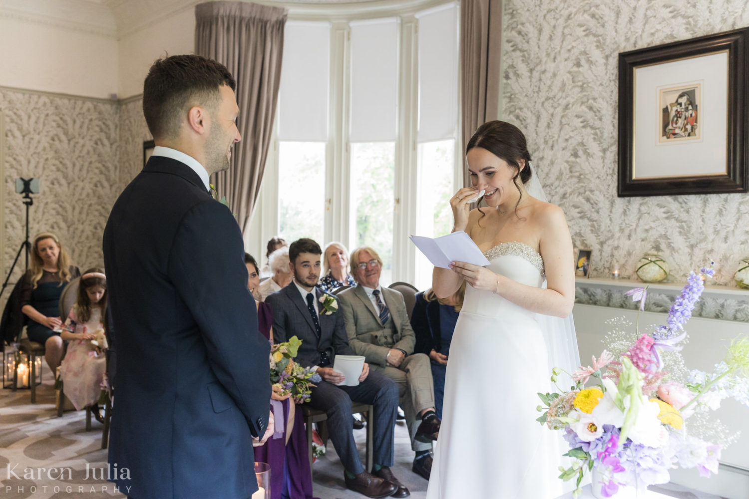 bride reads her vows to her groom during the the wedding ceremony