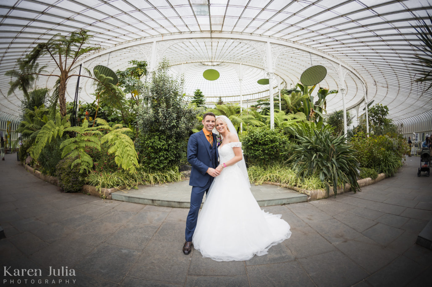 bride and groom portrait in Kibble Palace on their wedding day