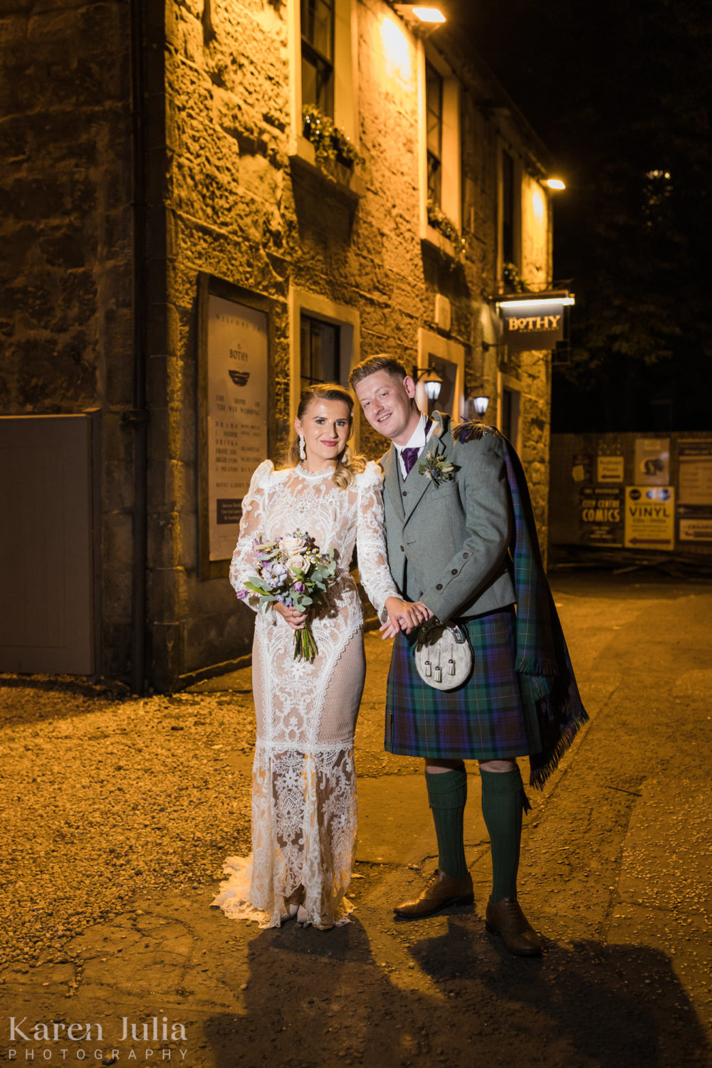 bride and groom wedding day night portrait outside the Bothy