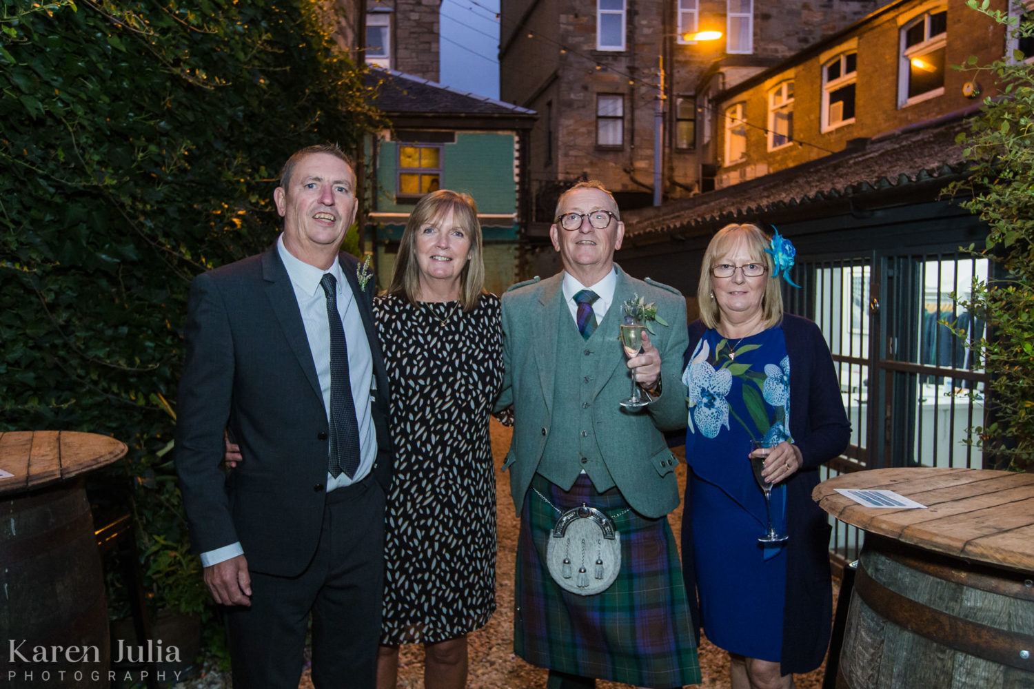 wedding guest group photo in the Bothy garden at night