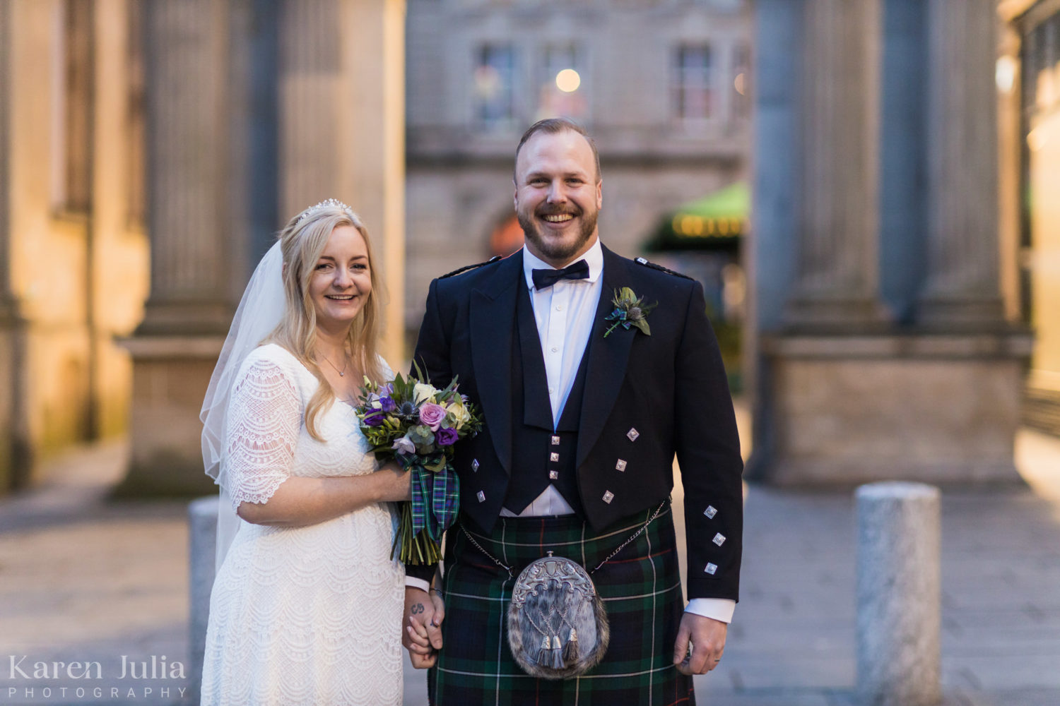 bride and groom portrait on their wedding day in Royal Exchange Square