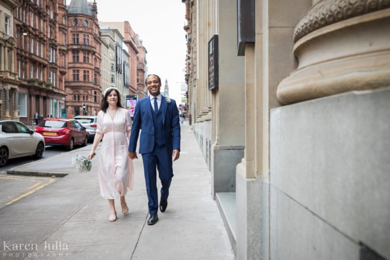 bride and groom wedding day portrait on St Vincent Street in Glasgow city centre