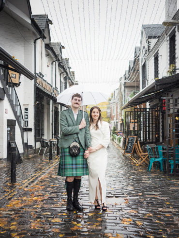 bride and groom pose for a portrait in Ashton Lane