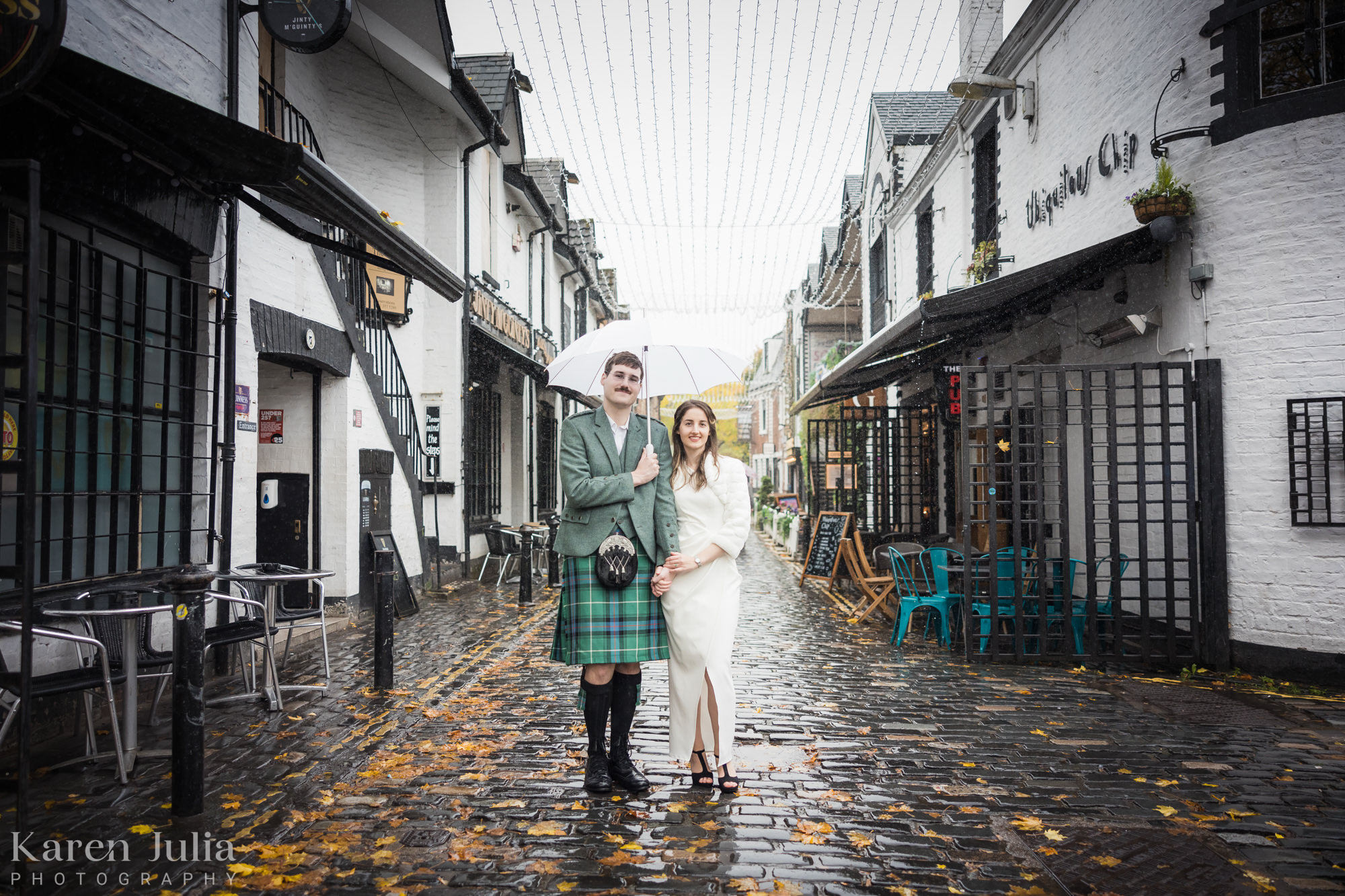 bride and groom pose for a portrait in Ashton Lane