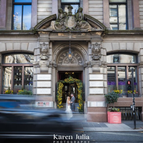 bride and groom portrait ouutside the Corinthian Club on their wedding day