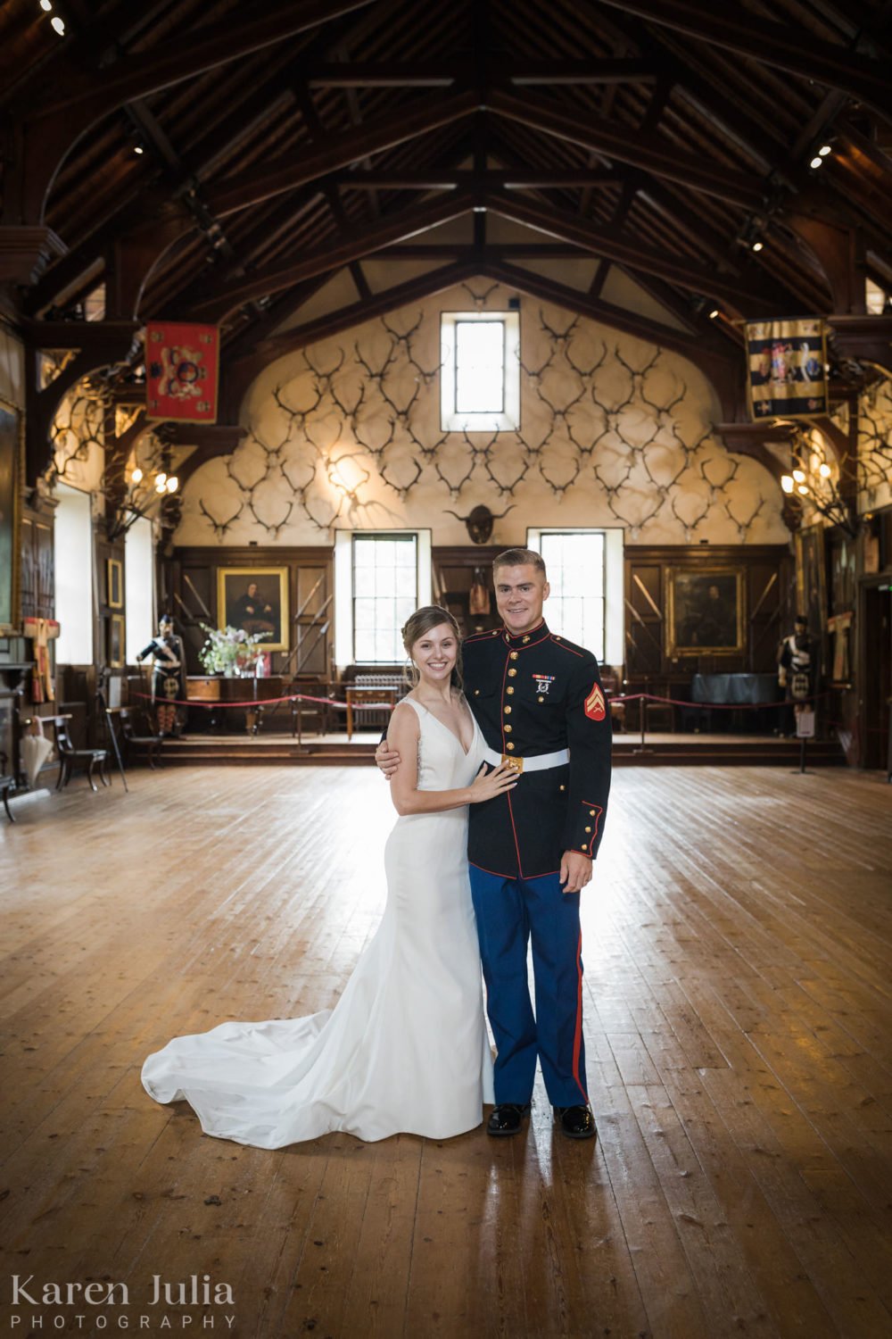 bride and groom portrait in the main hall at Blair Castle