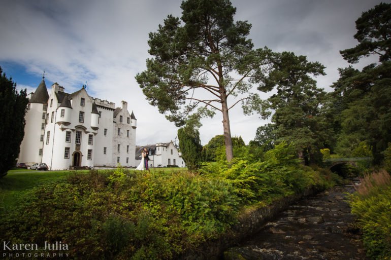 bride and groom outside Blair Castle in Perth on their wedding day