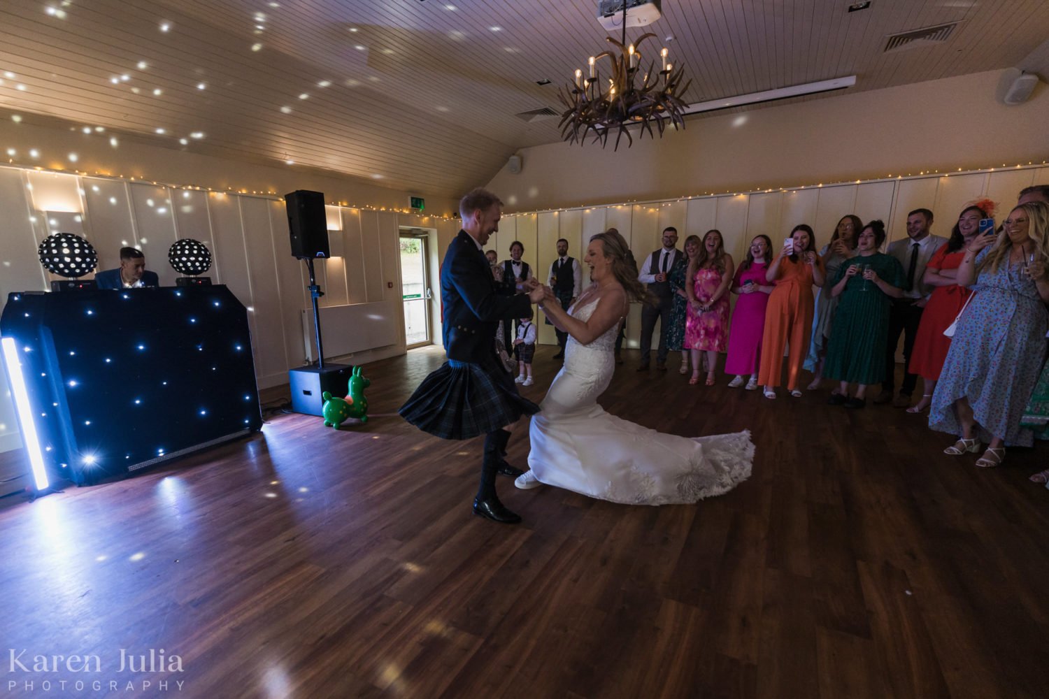 bride and groom dancing during their first dance at Loch Lomond Arms