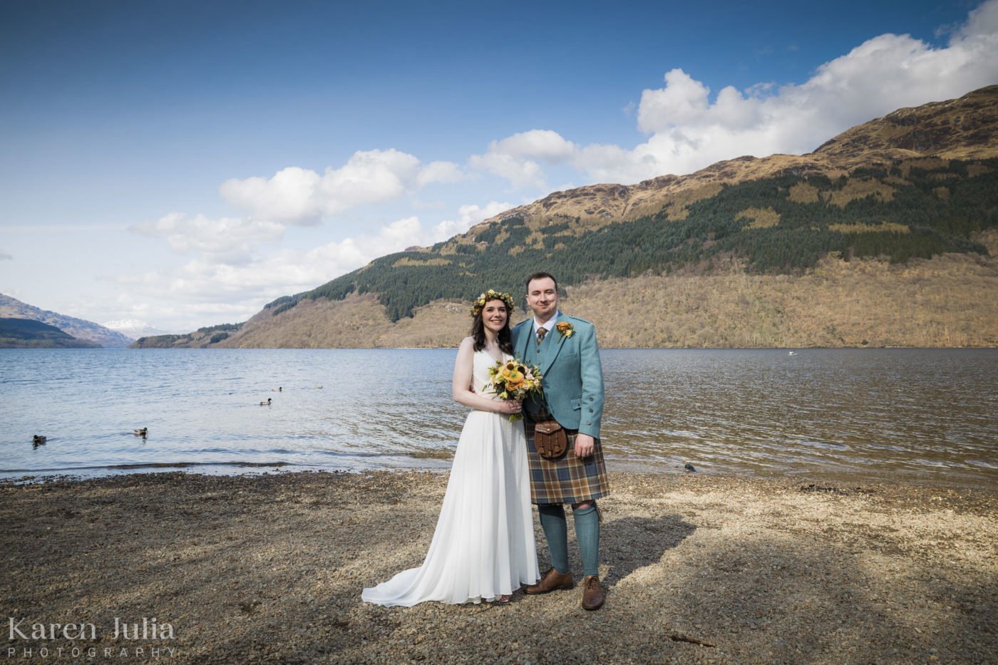 bride and groom wedding day portrait at Firkin Point in Loch Lomond