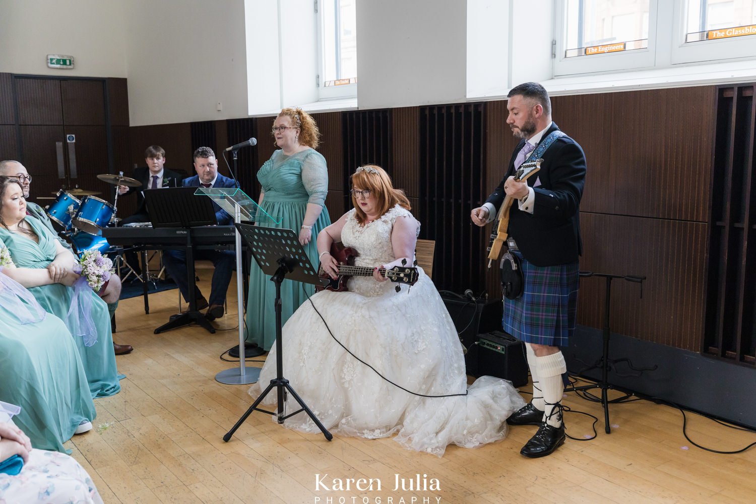 bride and groom, who are musicians, place a musical piece for guests