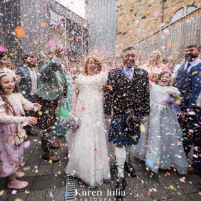 bride and groom showered with confetti at Maryhill Burgh Halls