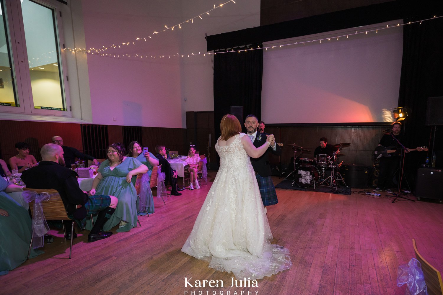 bride and groom take to the dance floor for their first dance