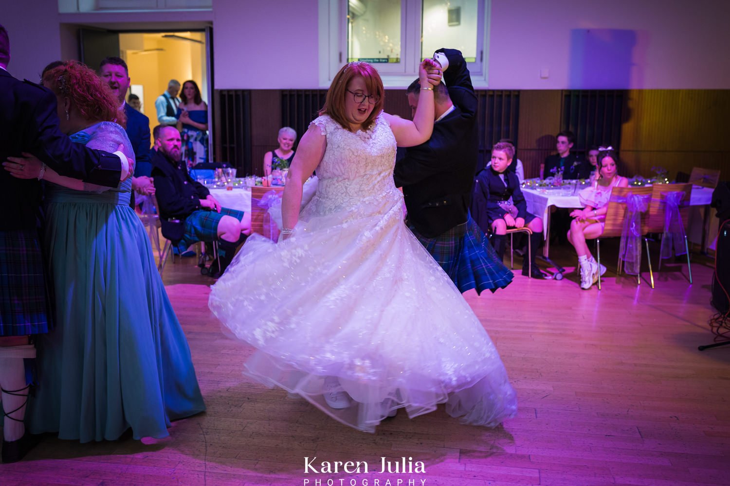 bride and groom enjoy their first dance together