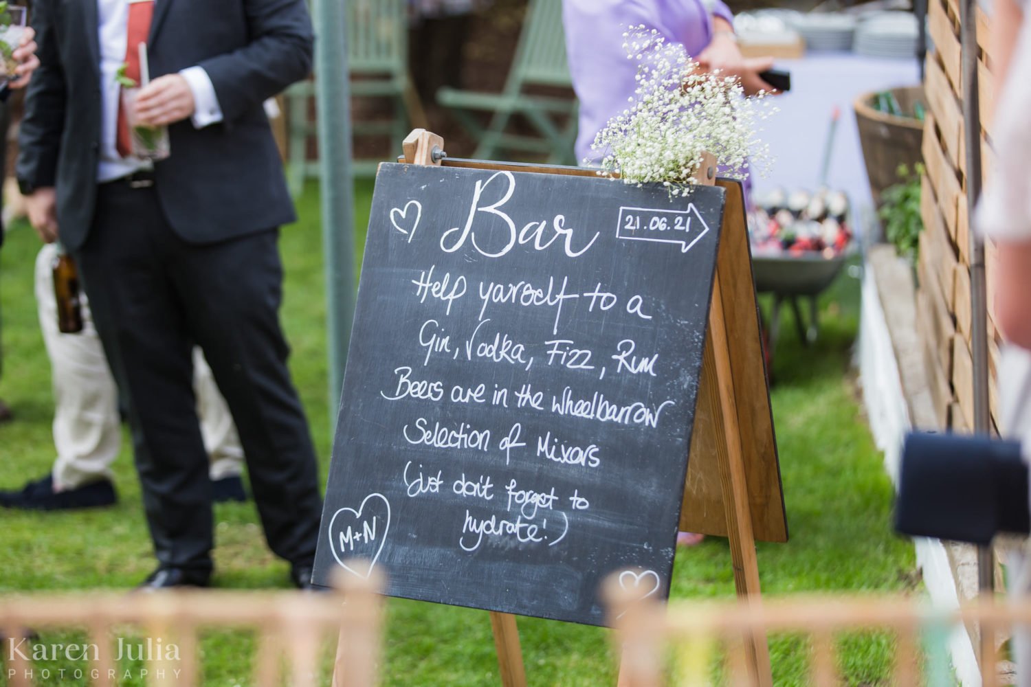 wedding day details featuring signage for guests