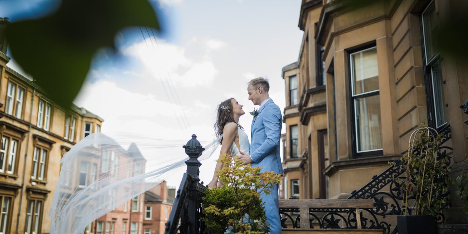 bride and groom wedding day portrait on Gardner Street near Cottiers
